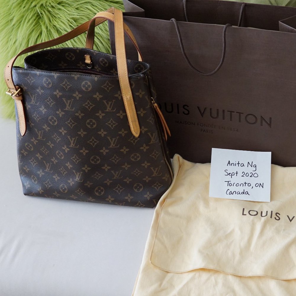 Authentic LE Rare LV Voltaire in Monogram